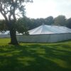 A photo of Coventry Godiva Music Festival uses Kingsmead clearspan and pole marquees for its infrastructure by Kingsmead Marquees